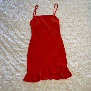 Red orange mini dress with ruffle skirt trim
